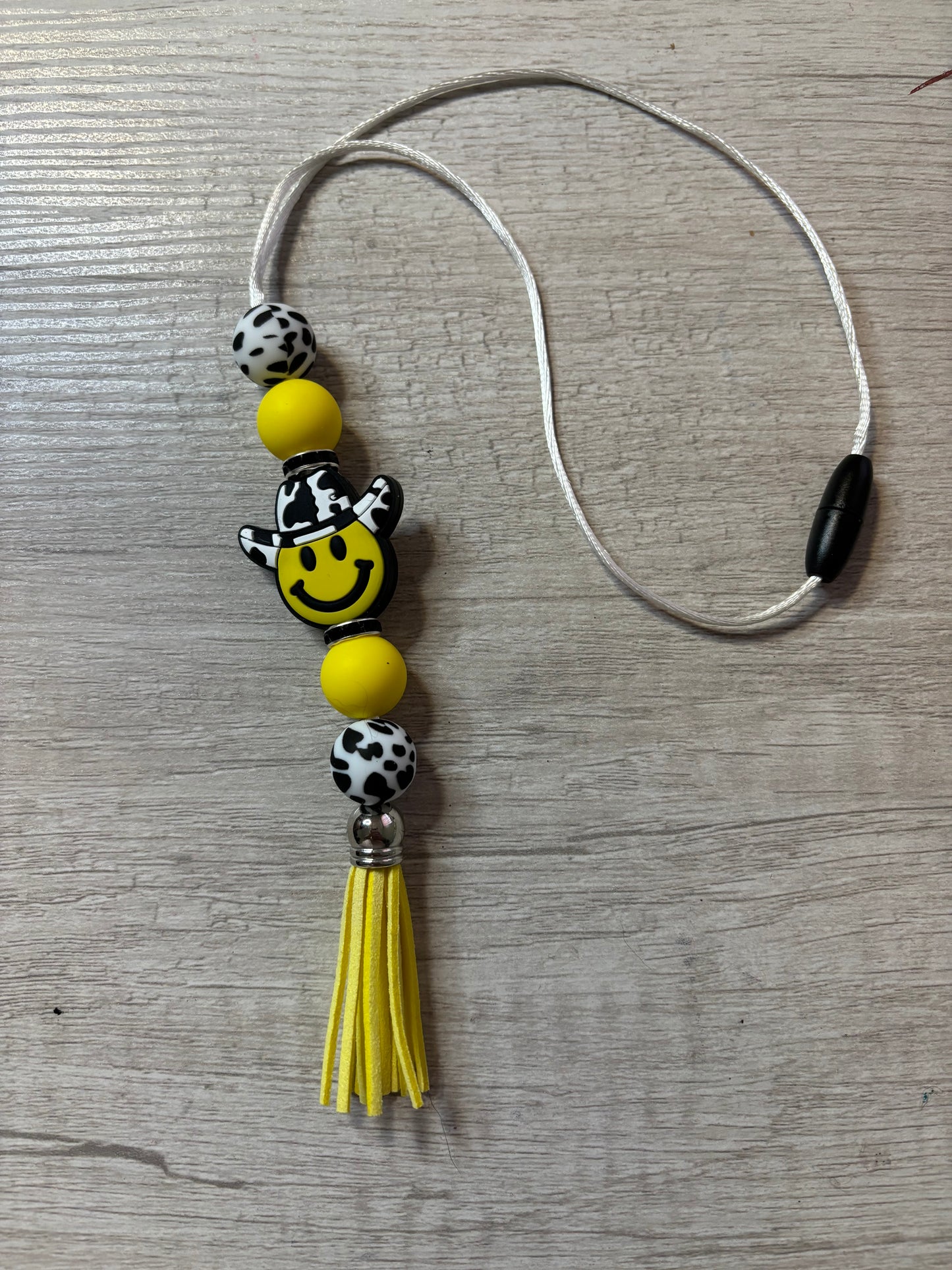 Cowboy smiley face car charm